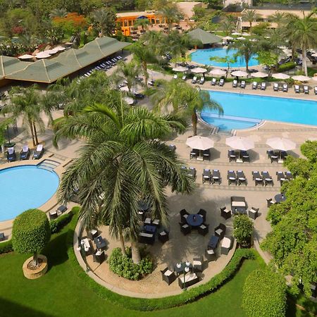 Hilton Cairo Heliopolis Hotel Exterior foto The pool at the Serena Hotel